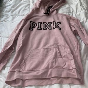 light pink hoodie.